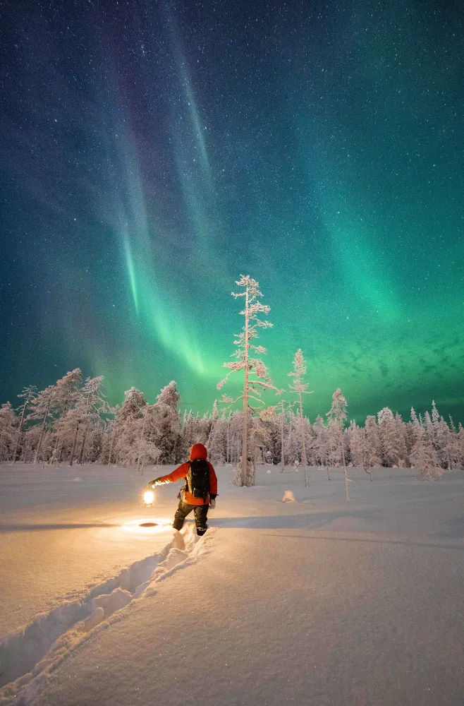 Snowshoe safari to hunt the northern lights